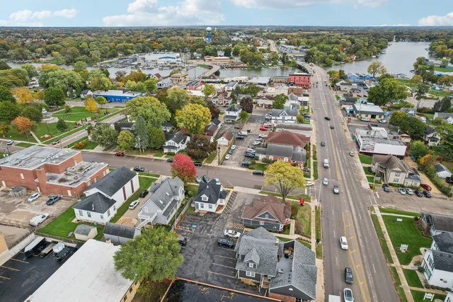 an aerial view of residential houses with outdoor space