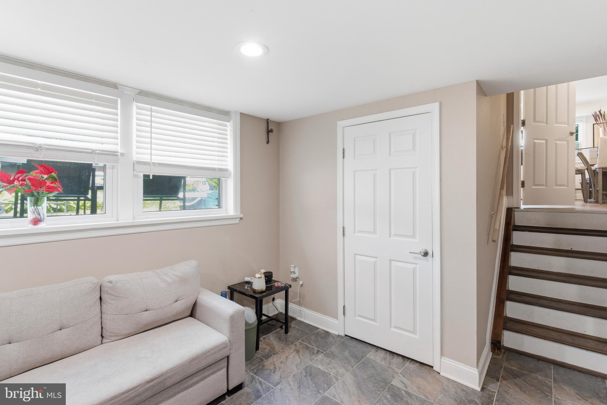 912 Shelley Road Towson, MD 21286 - Photo 23 of 27 a living room with furniture and a window
