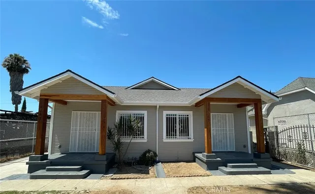 a front view of a house with yard