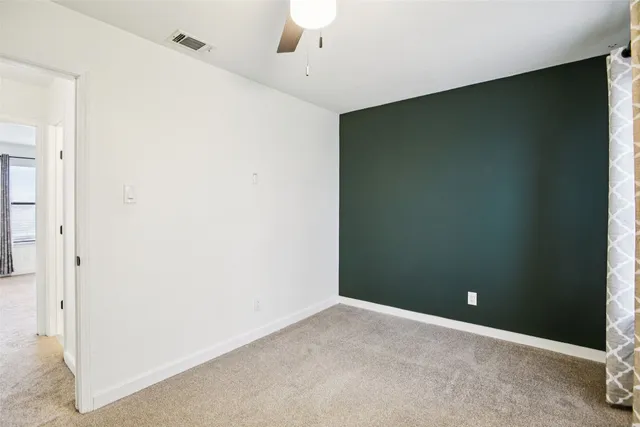 an empty room with a workbench