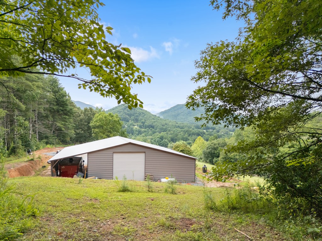 115 Ash Loop Road Hayesville, NC 28904 - Photo 12 of 37 a house with trees in the background