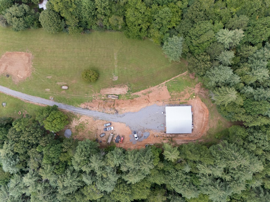 115 Ash Loop Road Hayesville, NC 28904 - Photo 20 of 37 an aerial view of a house with a yard and lake view