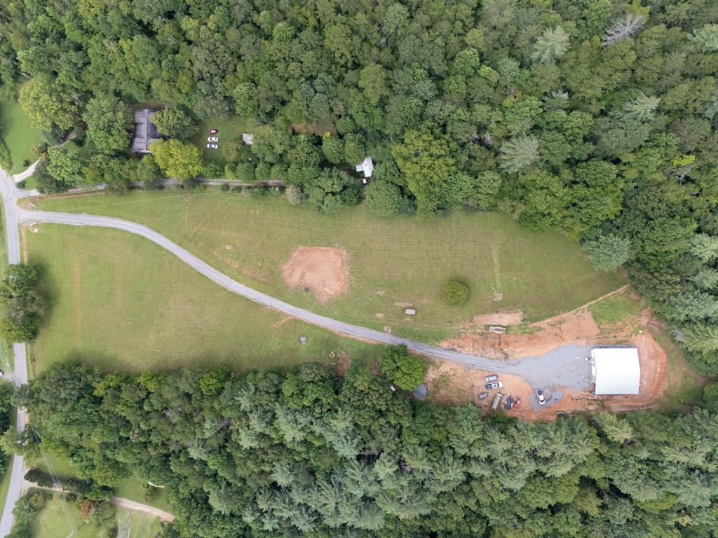 115 Ash Loop Road Hayesville, NC 28904 - Photo 21 of 37 an aerial view of a house with a yard and lake view