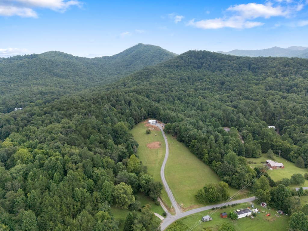 115 Ash Loop Road Hayesville, NC 28904 - Photo 22 of 37 a view of a house with a mountain in the background