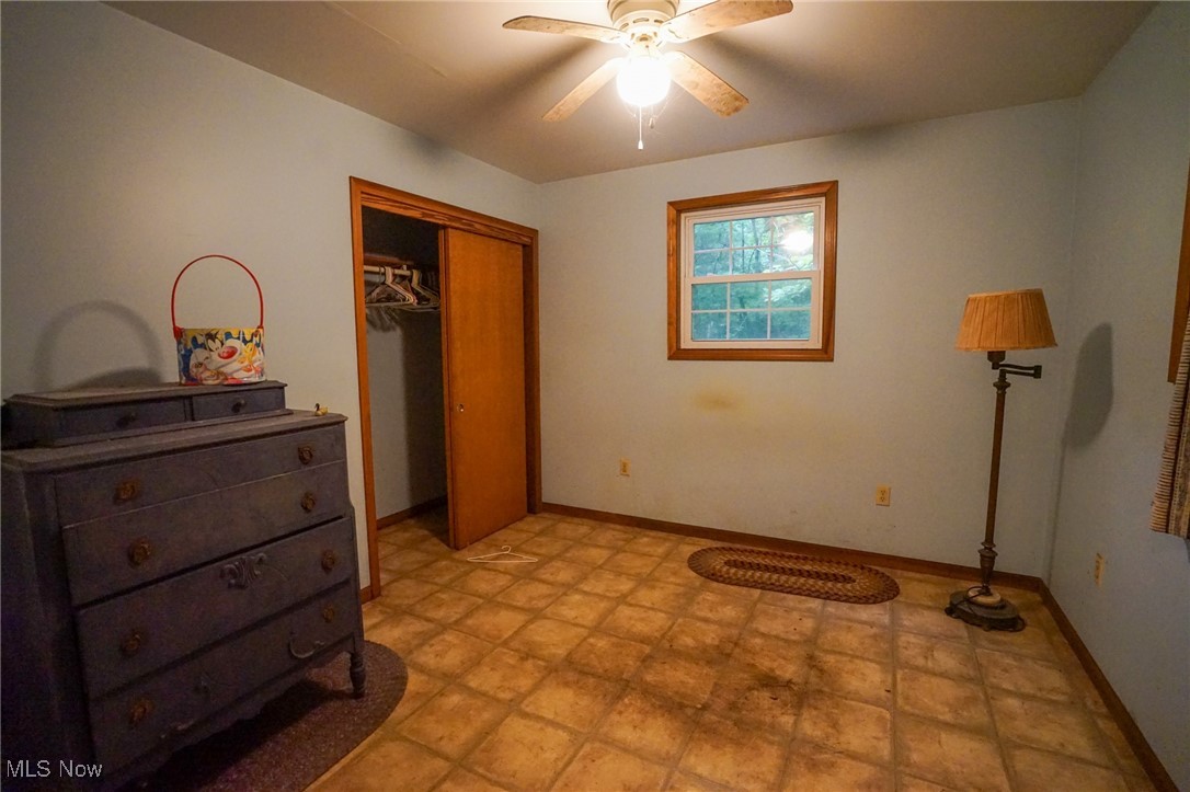 34799 Paw Road Lower Salem, OH 45745 - Photo 17 of 50 Bedroom featuring a closet and a ceiling fan