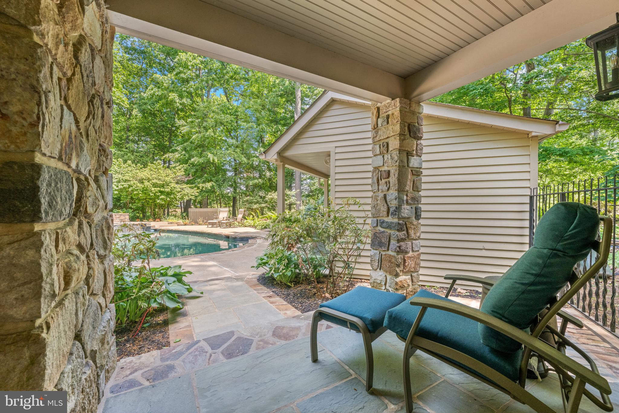 155 Barton Drive Spring City, PA 19475 - Photo 14 of 65 Covered stone porch & custom shed