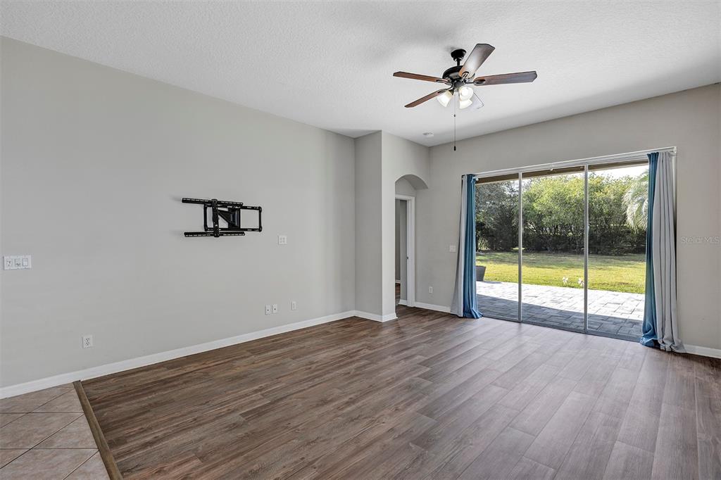 1816 Cherry Ridge Drive Lake Mary, FL 32746 - Photo 14 of 64 wooden floor in an empty room with a window