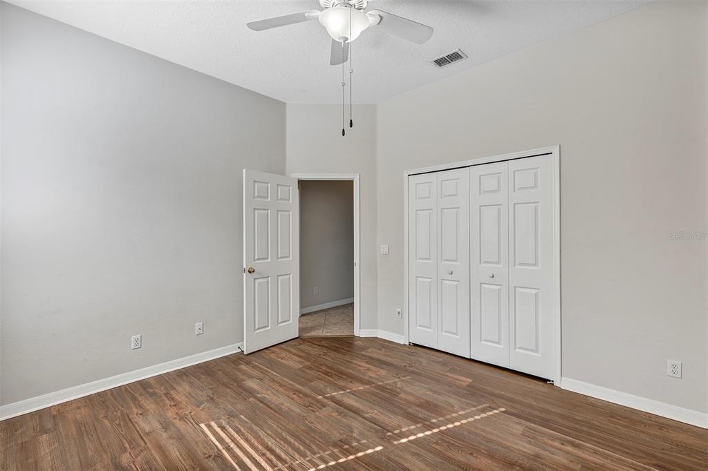 1816 Cherry Ridge Drive Lake Mary, FL 32746 - Photo 28 of 64 a view of an empty room with wooden floor
