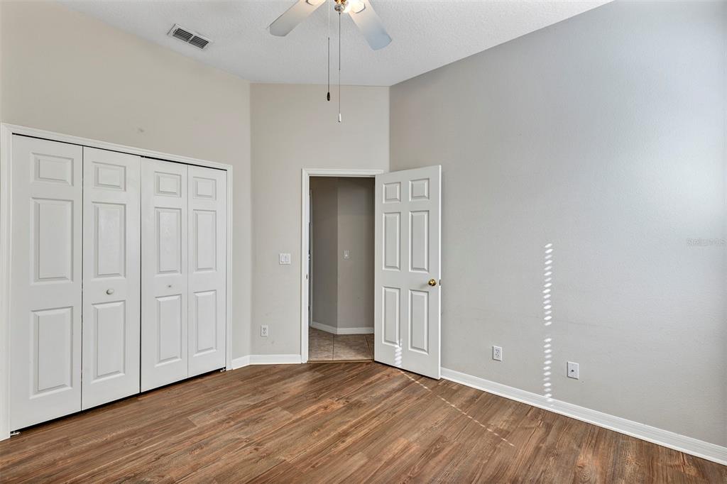 1816 Cherry Ridge Drive Lake Mary, FL 32746 - Photo 30 of 64 a view of an empty room with wooden floor