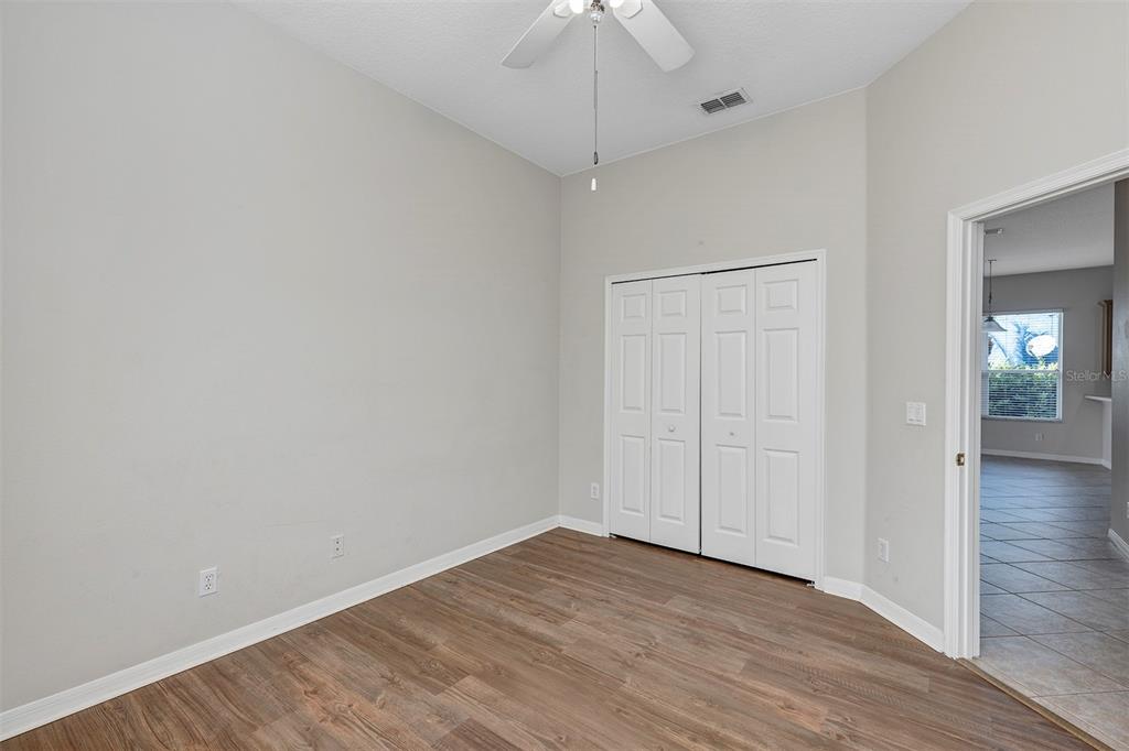 1816 Cherry Ridge Drive Lake Mary, FL 32746 - Photo 31 of 64 a view of an empty room with wooden floor