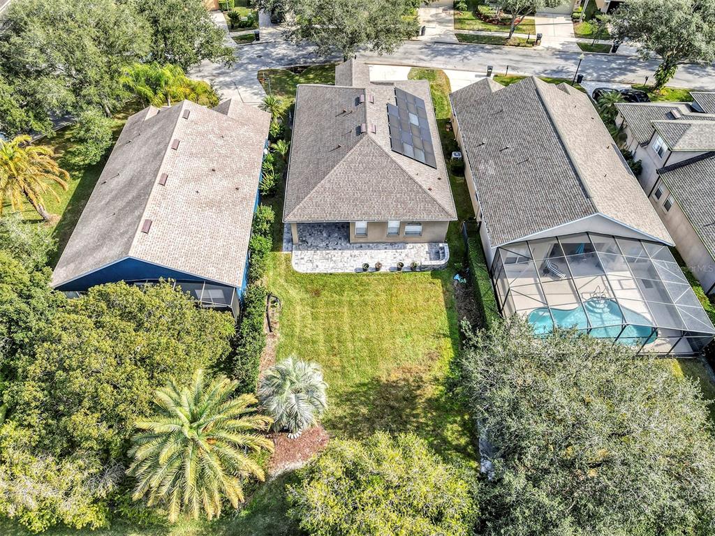 1816 Cherry Ridge Drive Lake Mary, FL 32746 - Photo 42 of 64 an aerial view of a house with swimming pool and large trees