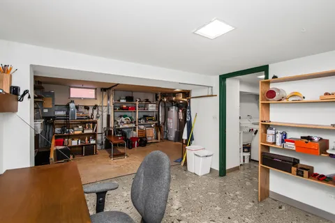 a living room with lots of furniture and closet