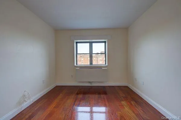 a view of a bathroom from a hallway