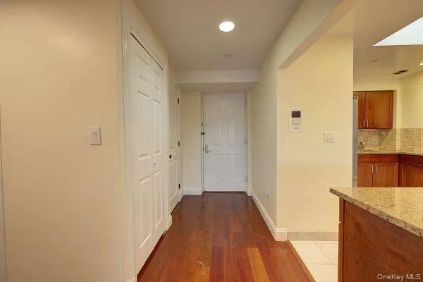 a view of livingroom with hardwood floor and a ceiling fan