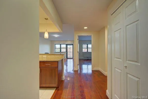 a kitchen with stainless steel appliances granite countertop a sink and cabinets