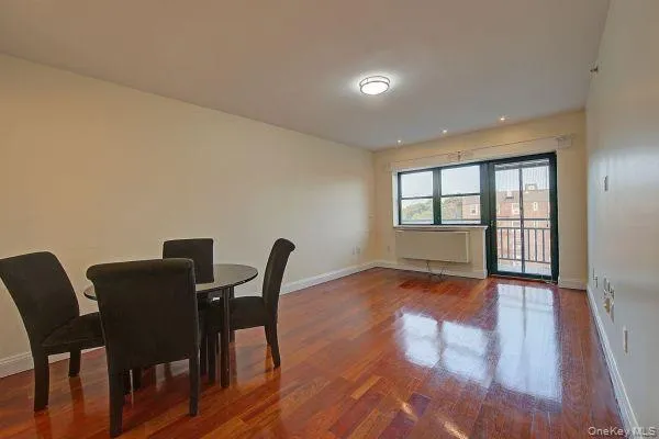 front view of a building with a garden