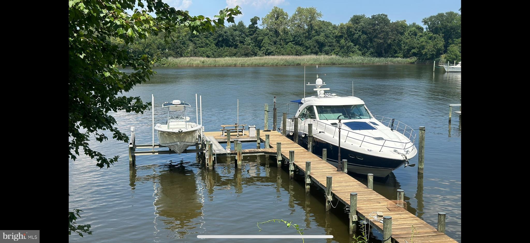 7671 Colonial Beach Road Pasadena, MD 21122 - Photo 2 of 6 Incredible water access- 60' & 27' boat