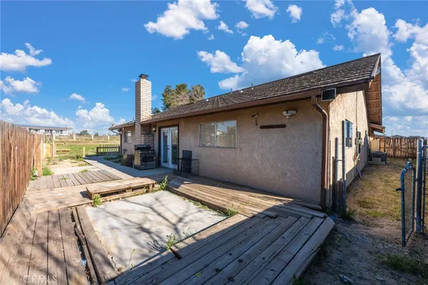 a view of a yard with an ocean view