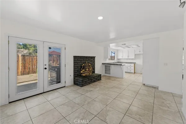 a kitchen with a sink and a stove