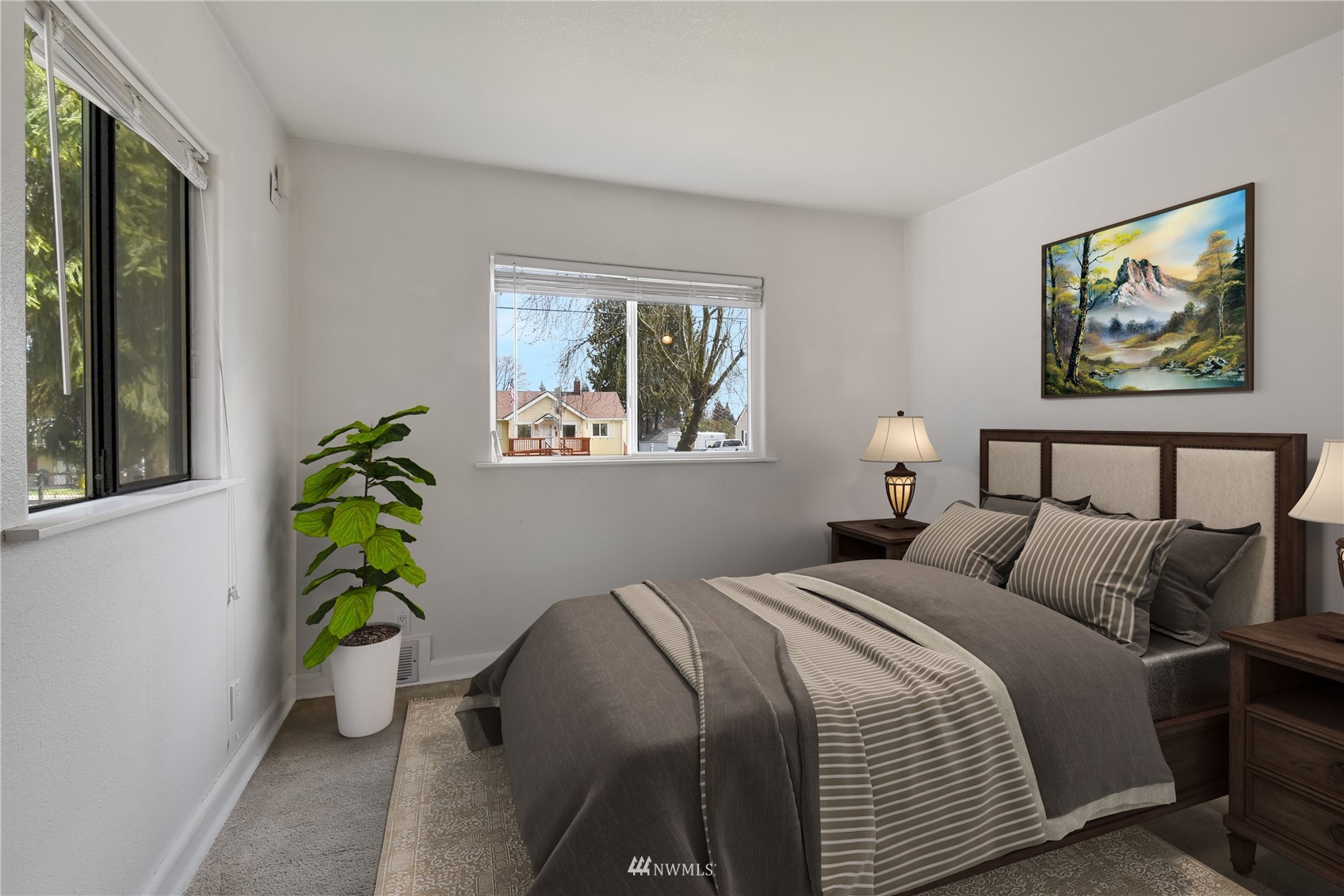 6422 Cady Road Everett, WA 98203 - Photo 13 of 21 a bedroom with bed and a potted plant