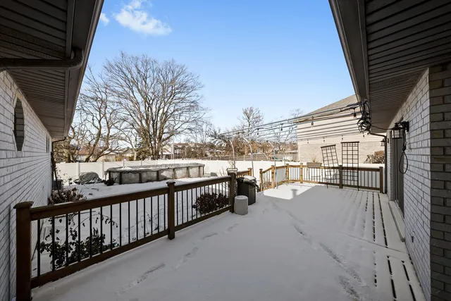 a bed room with a bed and a chair