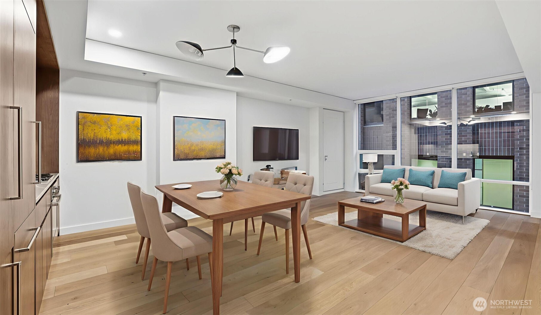 121 Stewart Street, Unit 905 Seattle, WA 98101 - Photo 32 of 37 a view of a livingroom with furniture and a table