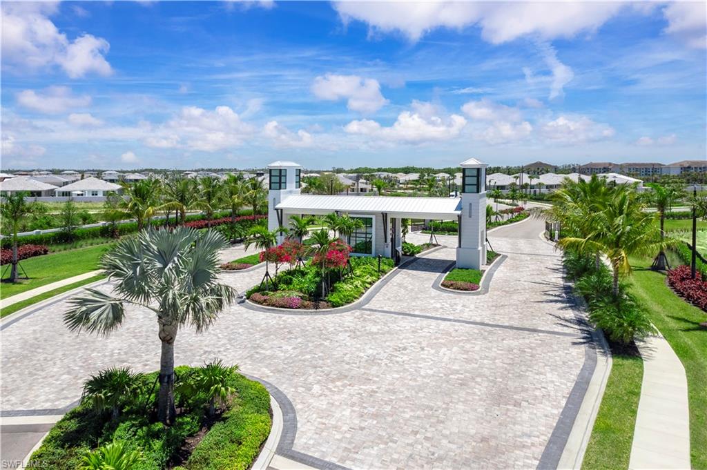 8775 Oceana Way Naples, FL 34114 - Photo 13 of 30 a view of a garden with a flower in a garden