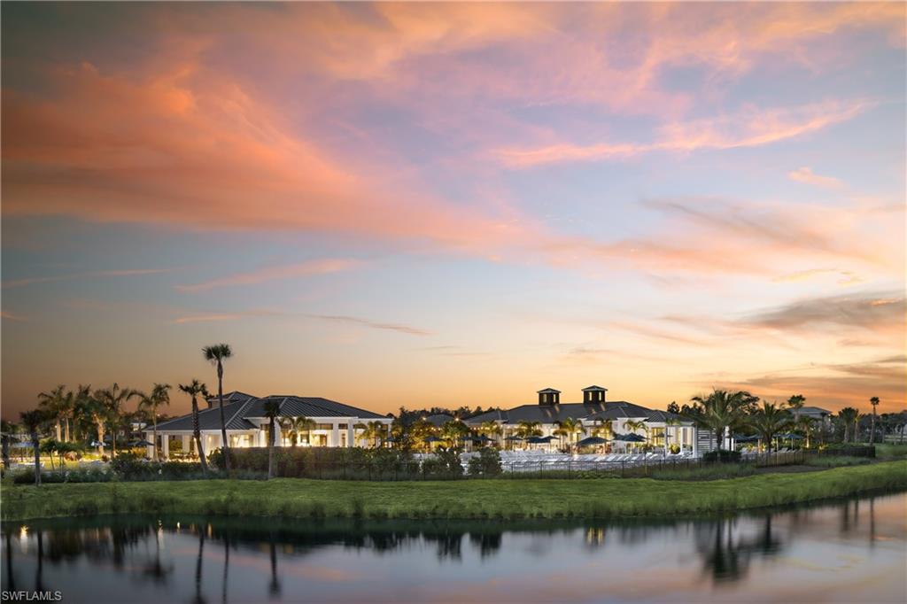 8775 Oceana Way Naples, FL 34114 - Photo 26 of 30 a view of a lake with houses
