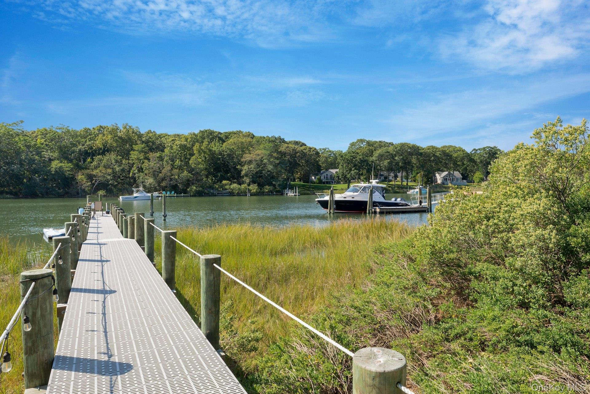 2280 Deep Hole Drive Mattituck, NY 11952 - Photo 25 of 35 Protected deep-water dock designed for effortless docking and secure mooring for multiple boats