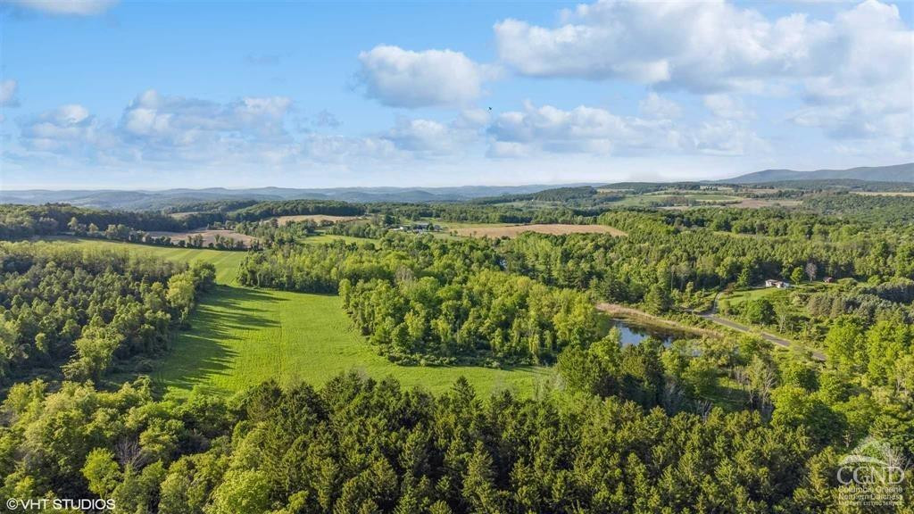 a view of lake with mountain