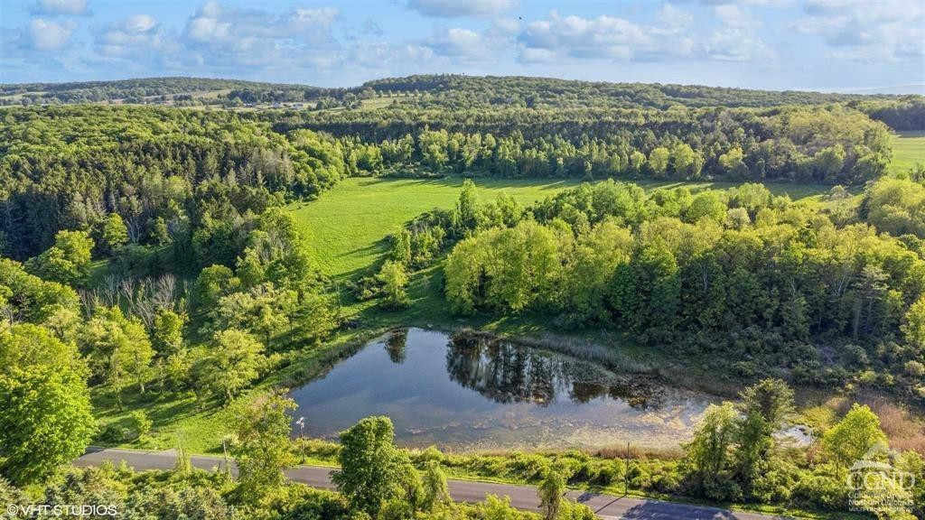 0 Skunks Misery Road Millerton, NY 12546 - Photo 4 of 12 a view of lake with mountain