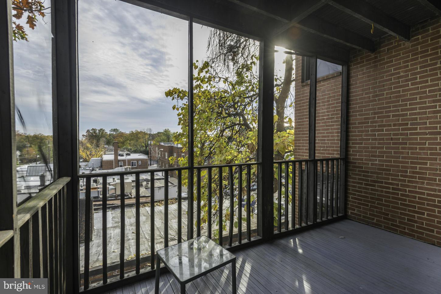 406 Cedar Street Northwest, Unit 3 Washington, DC 20012 - Photo 28 of 30 Screen Porch off Kitchen