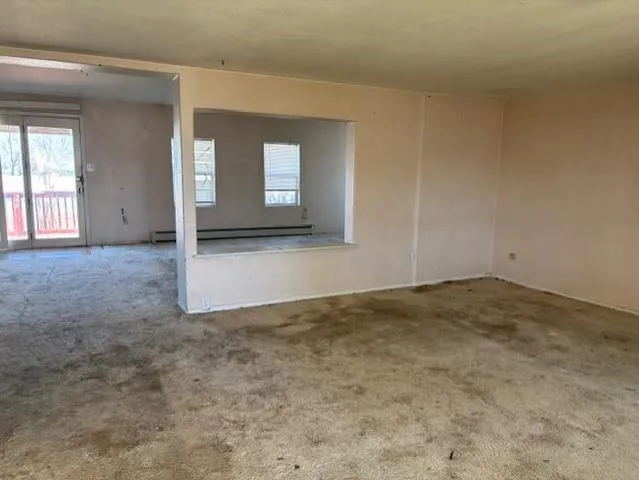 an empty room with windows