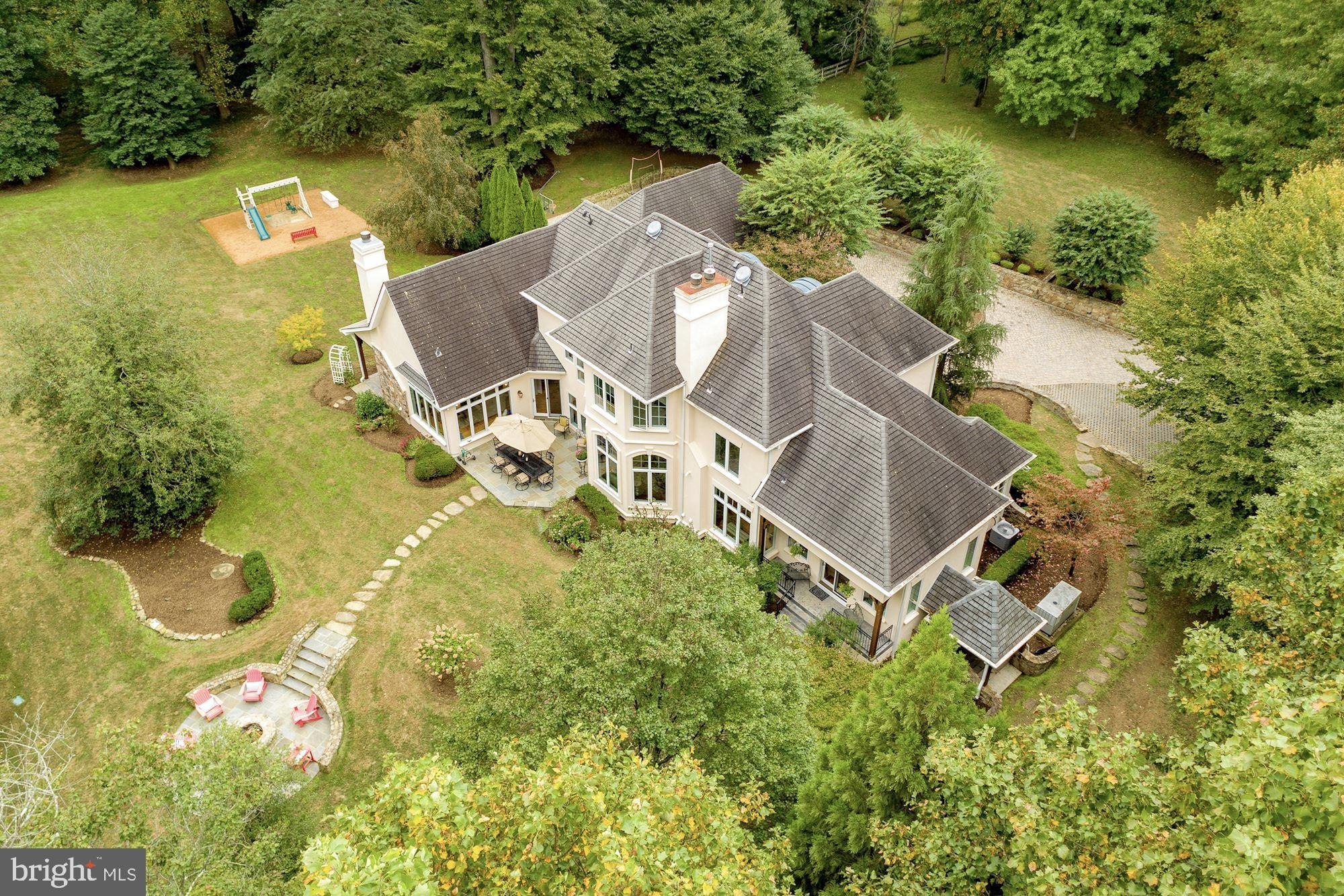 337 Springvale Road Great Falls, VA 22066 - Photo 104 of 120 an aerial view of residential house with outdoor space and trees all around