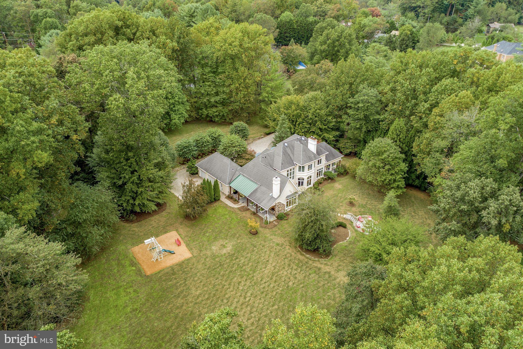 337 Springvale Road Great Falls, VA 22066 - Photo 108 of 120 an aerial view of a house with a yard