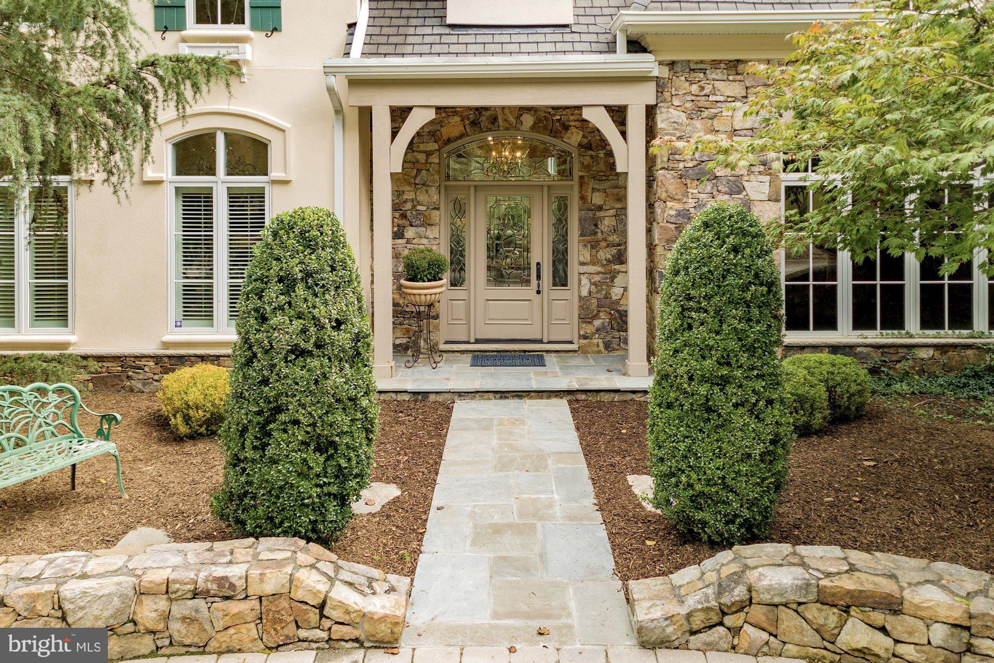 337 Springvale Road Great Falls, VA 22066 - Photo 12 of 120 Expansive stone walls and slate entry
