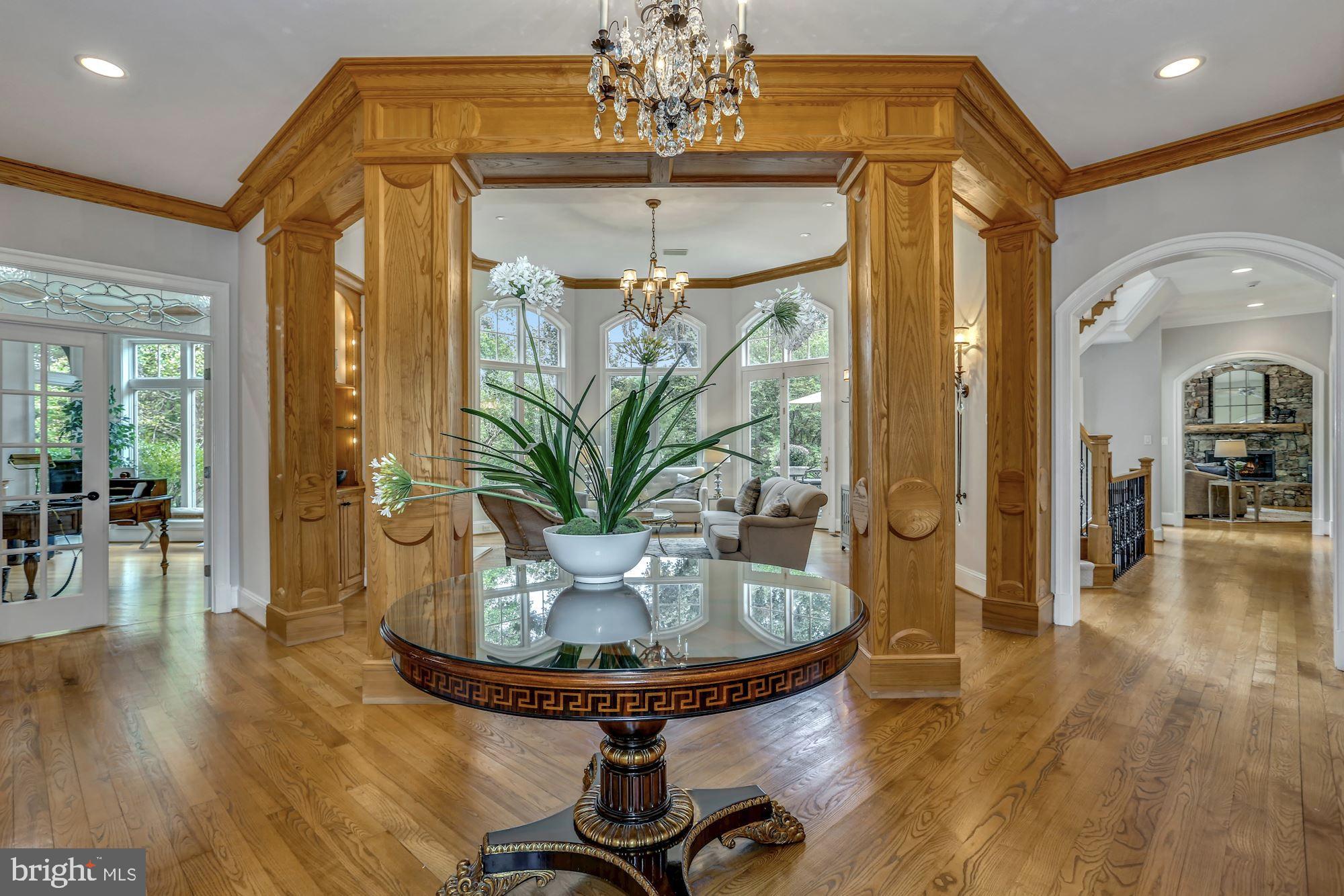 337 Springvale Road Great Falls, VA 22066 - Photo 14 of 120 a view of a dining room with furniture and wooden floor
