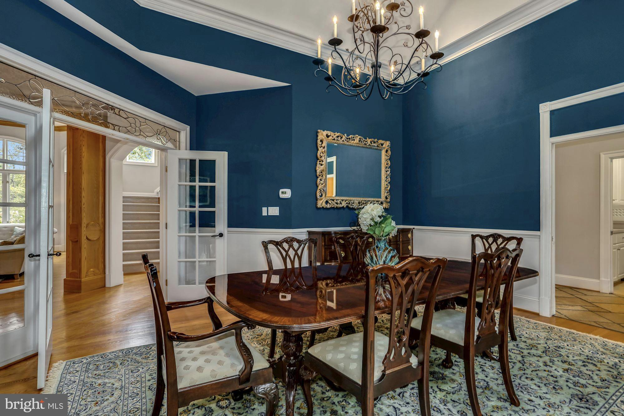 337 Springvale Road Great Falls, VA 22066 - Photo 21 of 120 a view of a dining room with furniture and wooden floor