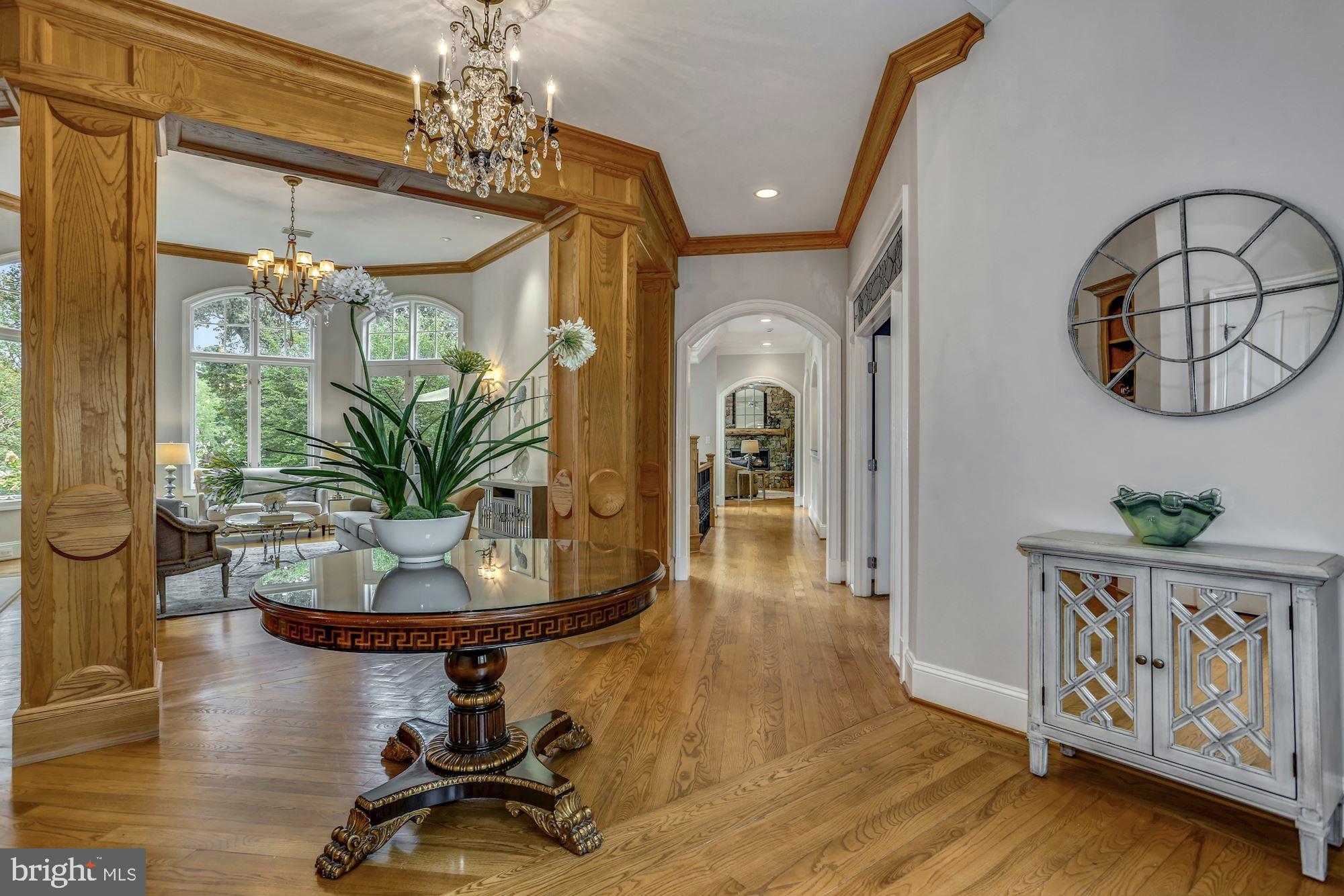 337 Springvale Road Great Falls, VA 22066 - Photo 22 of 120 a view of a dining room with furniture window and wooden floor