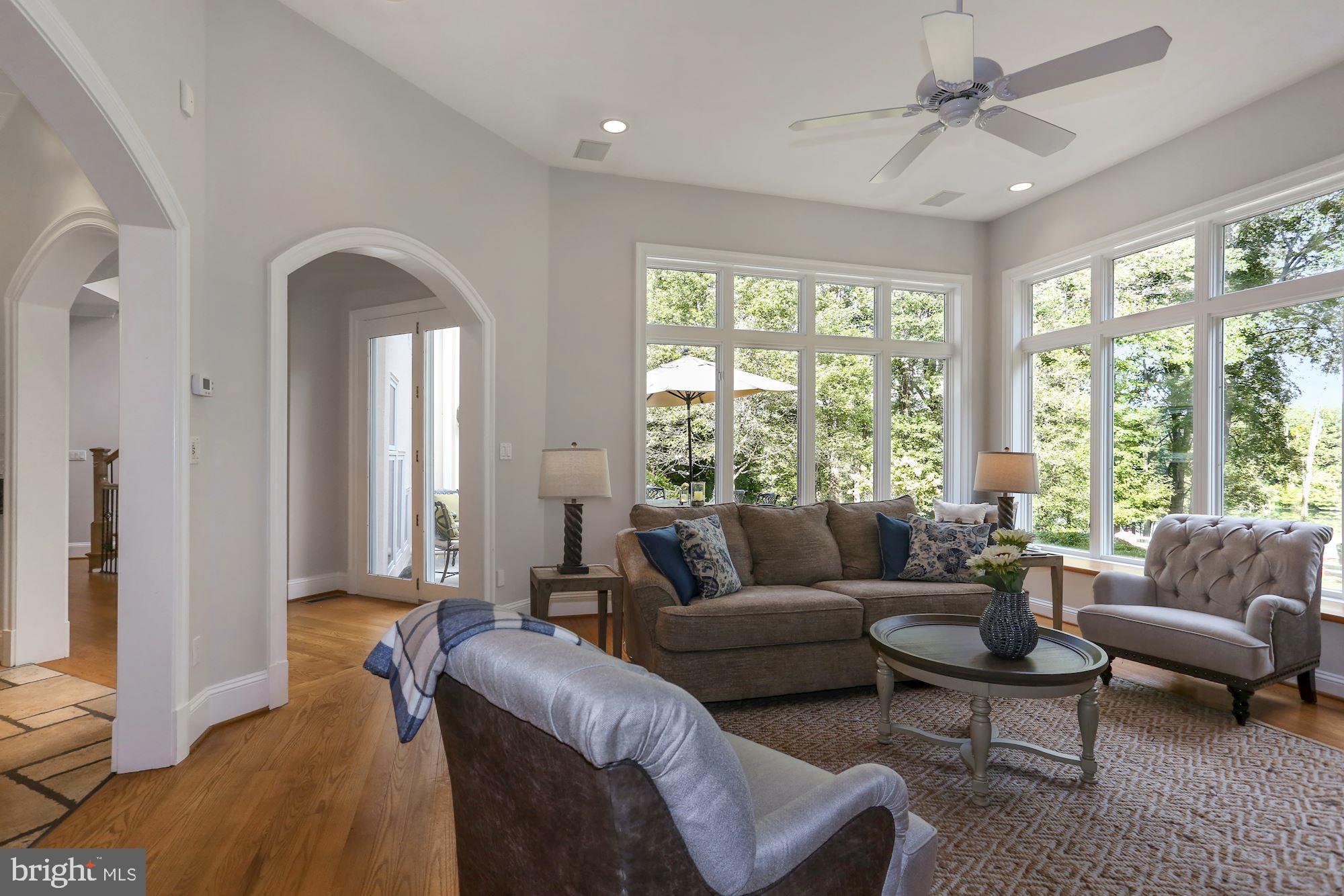 337 Springvale Road Great Falls, VA 22066 - Photo 34 of 120 a living room with furniture and a large window