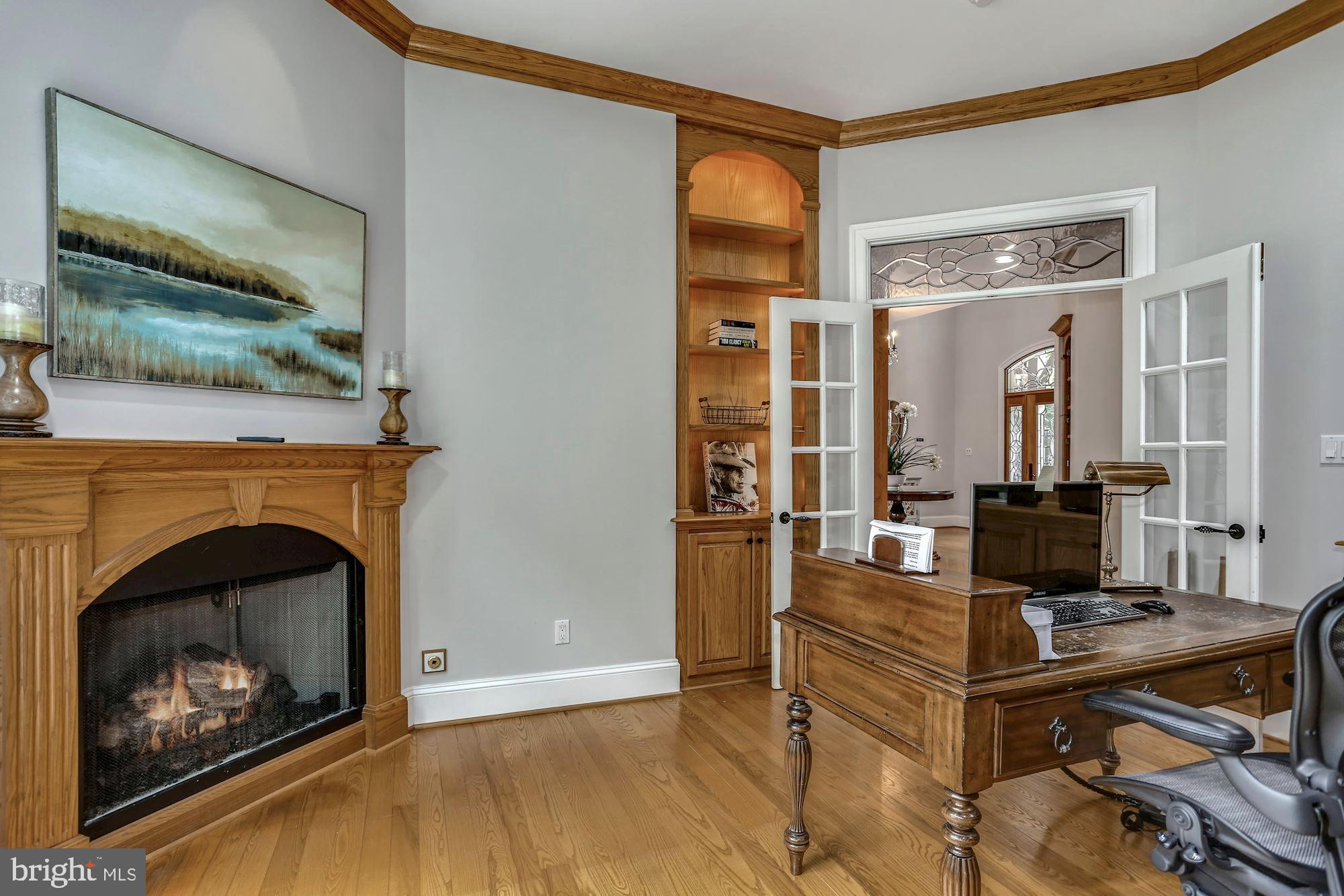 337 Springvale Road Great Falls, VA 22066 - Photo 36 of 120 a living room with furniture and a fireplace