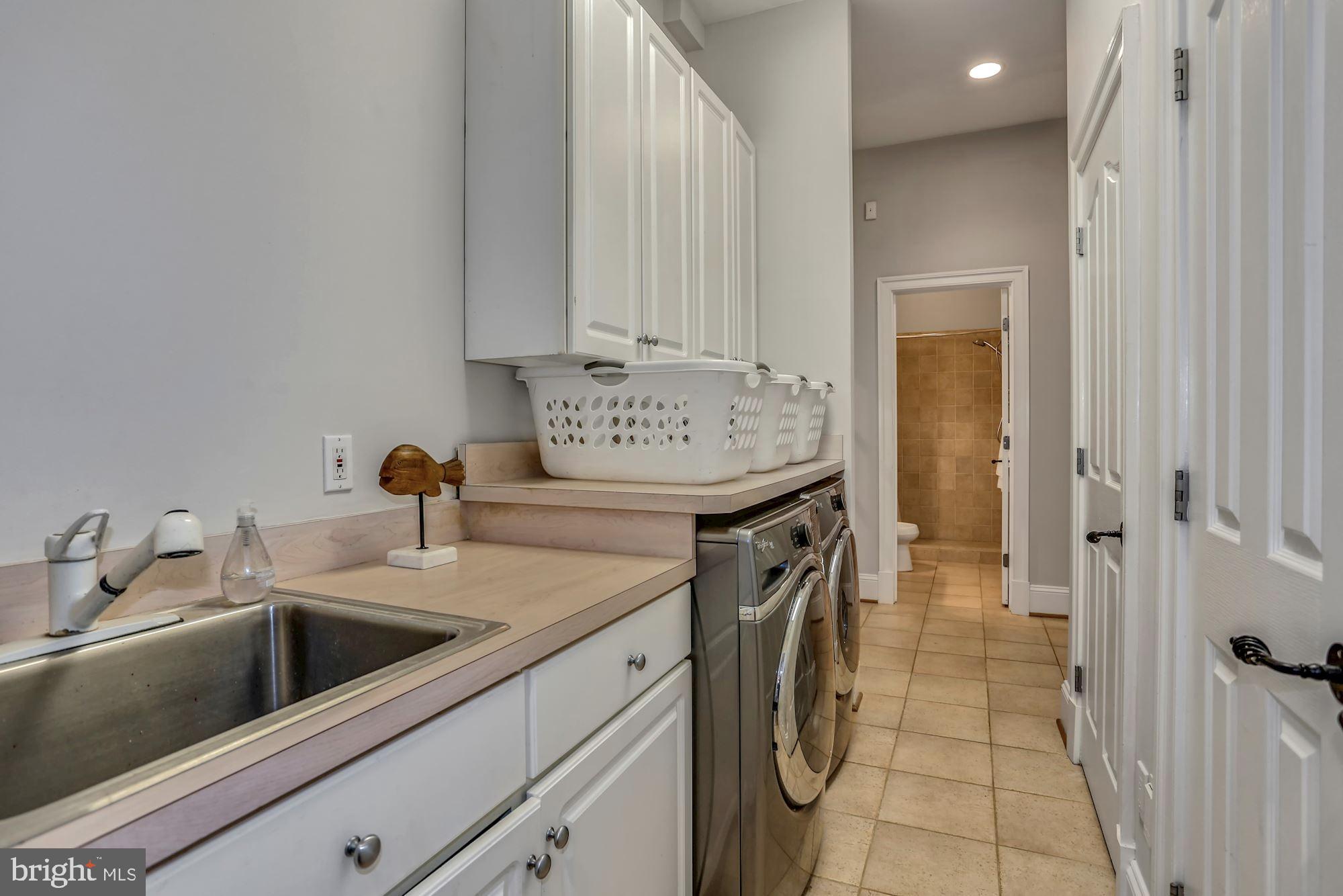 337 Springvale Road Great Falls, VA 22066 - Photo 49 of 120 Main level laundry/mudroom off garage