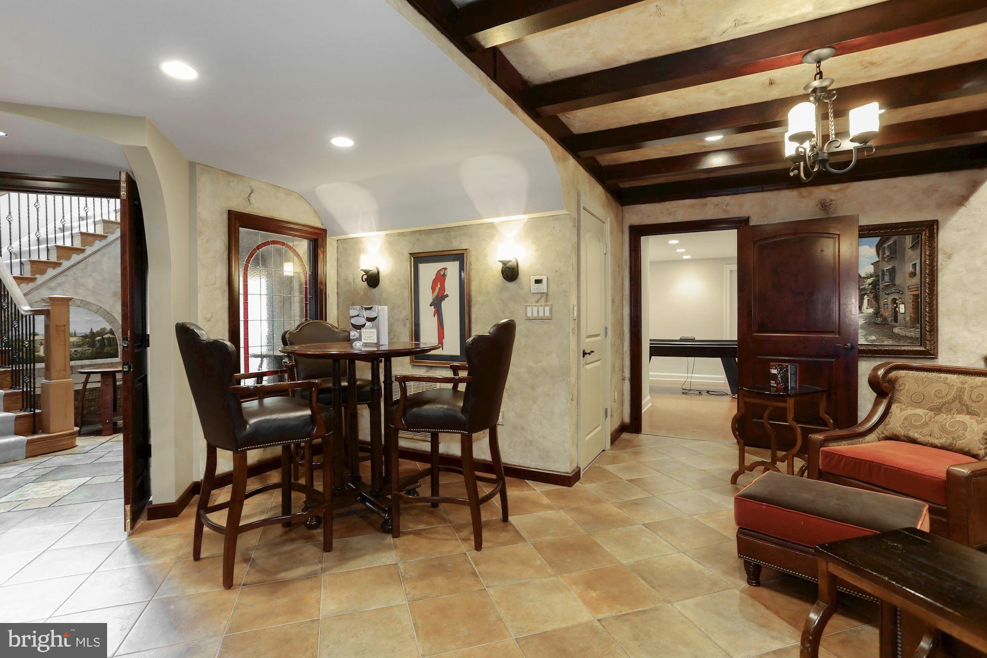 337 Springvale Road Great Falls, VA 22066 - Photo 56 of 120 a view of a dining room with furniture