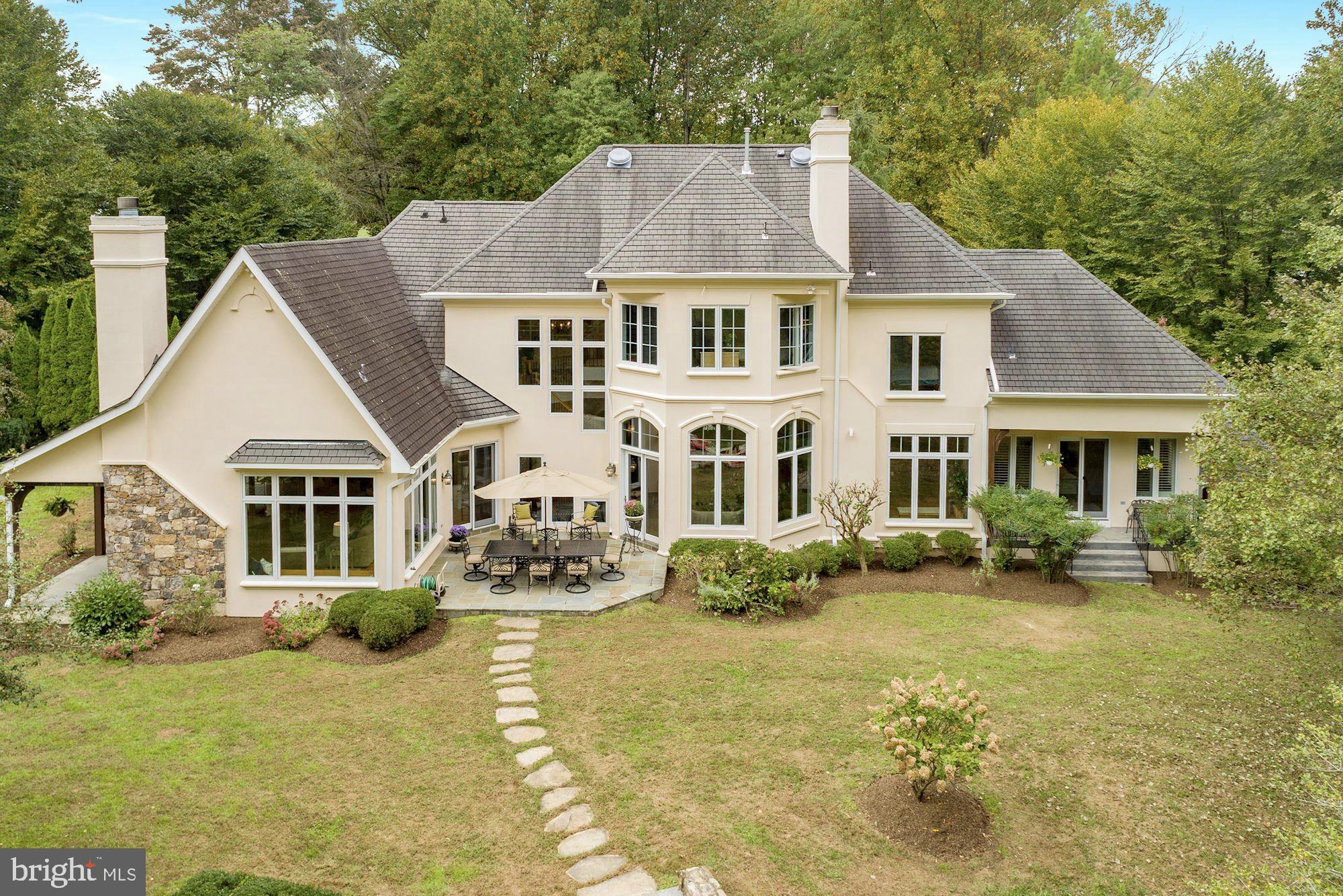 337 Springvale Road Great Falls, VA 22066 - Photo 100 of 120 a aerial view of a house with swimming pool