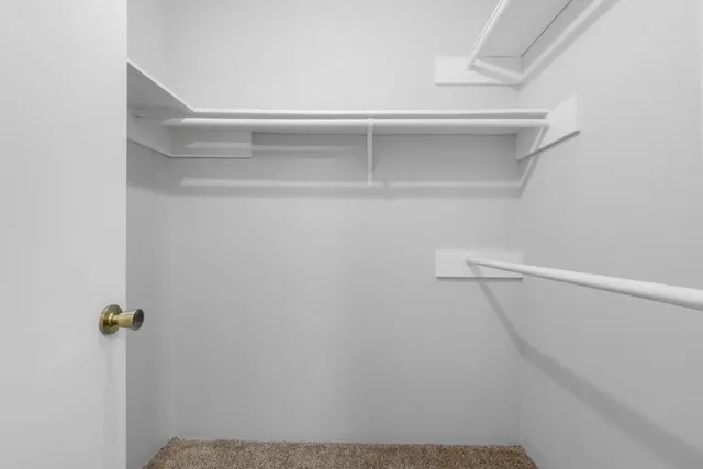 a view of small space with racks on the wall