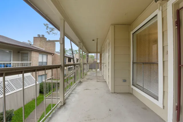 a view of balcony with stairs
