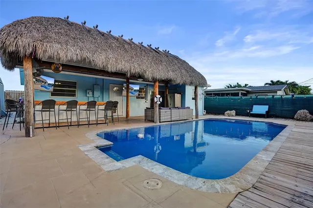 a view of a house with swimming pool