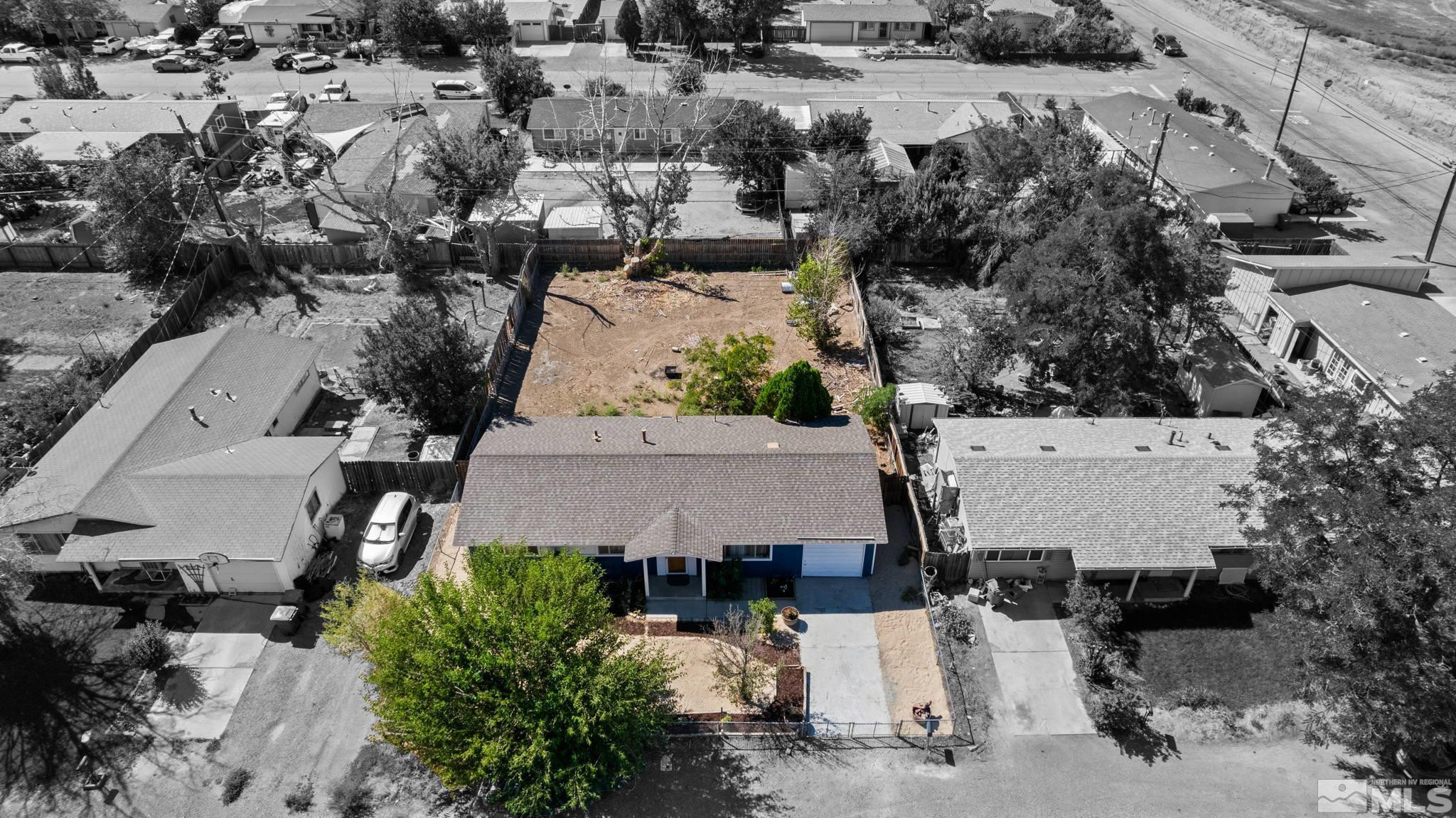 335 West Cedar Street Fernley, NV 89408 - Photo 26 of 26 an aerial view of multiple houses with outdoor space