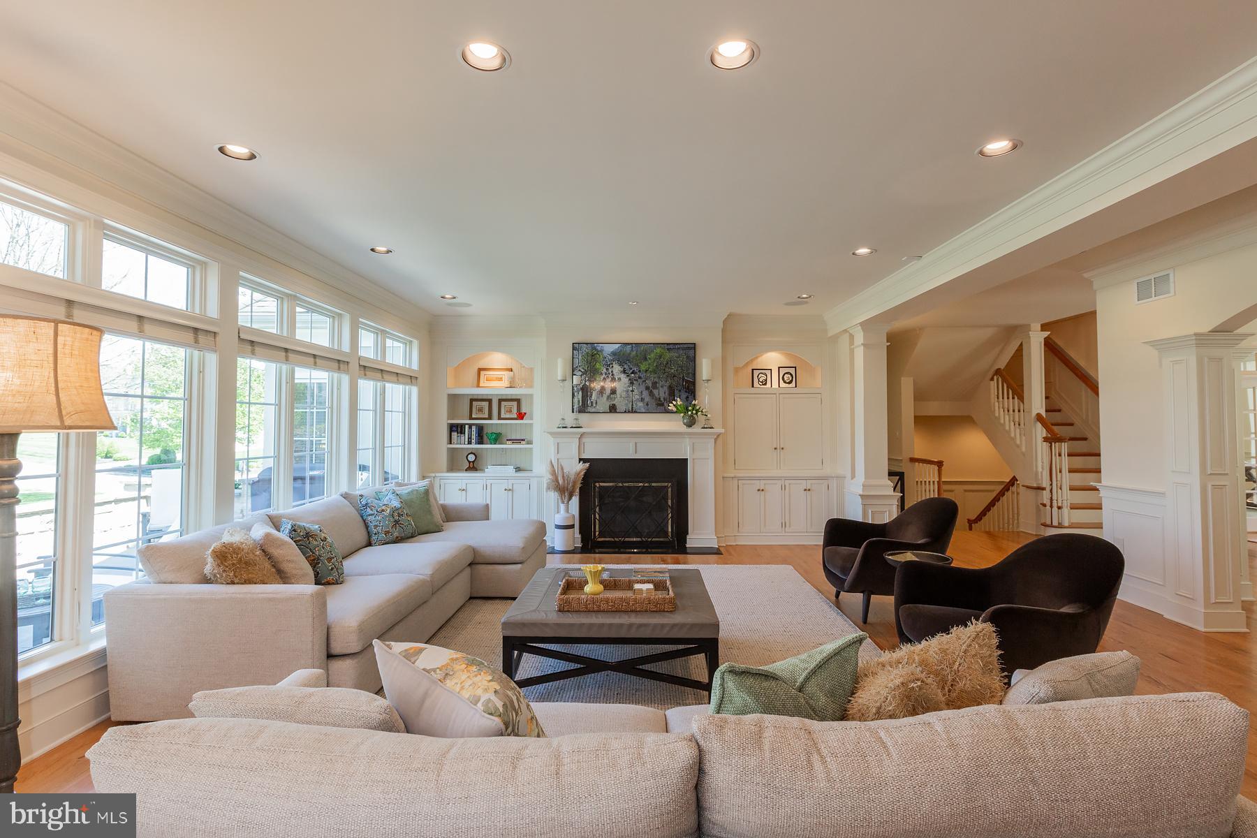 801 Greenside Drive Lititz, PA 17543 - Photo 11 of 57 a living room with furniture fireplace and a large window