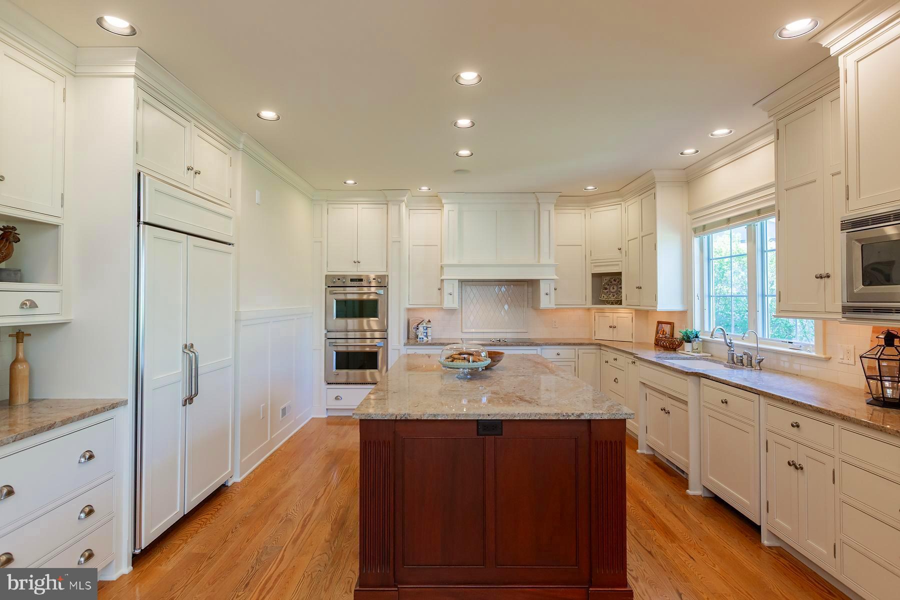 801 Greenside Drive Lititz, PA 17543 - Photo 17 of 57 a large kitchen with stainless steel appliances lots of counter space and wooden floor